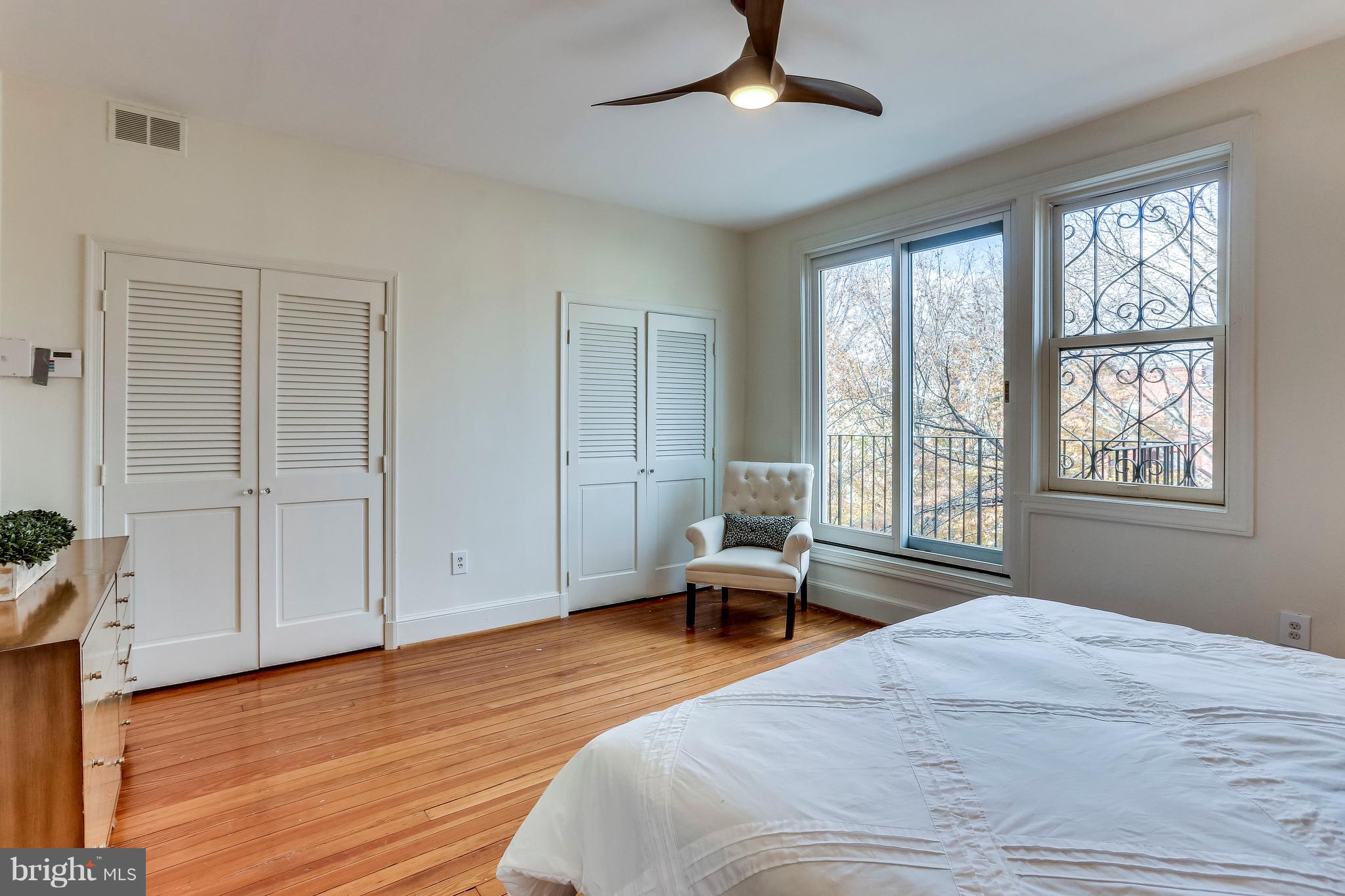 123 Tennessee Avenue Northeast Washington, DC 20002 - Photo 25 of 27 a bedroom with a bed and a window