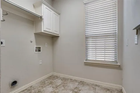 a view of a room that has a window