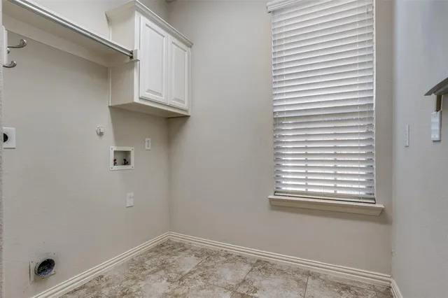 a view of a room that has a window