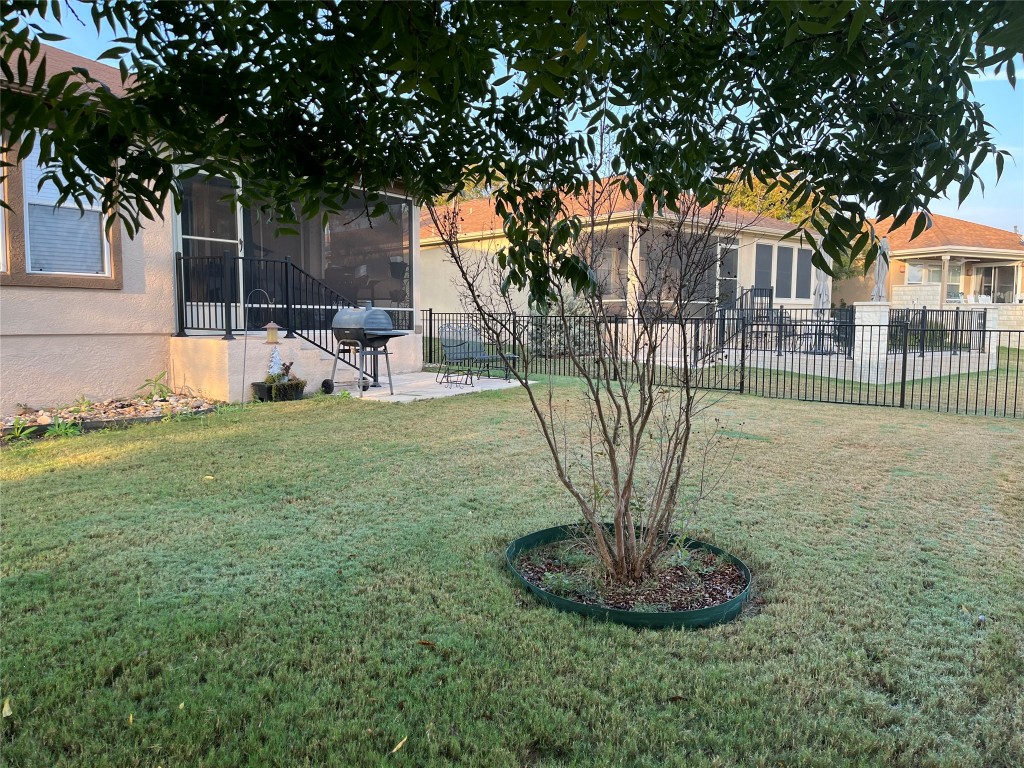 104 Monument Hill Trail Georgetown, TX 78633 - Photo 26 of 30 a view of a garden with a slide