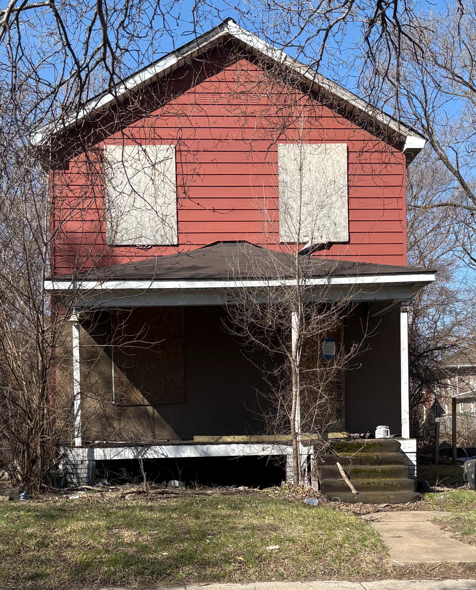 a front view of a house with garage