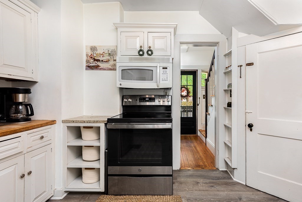 2 Orne Square, Unit 2 Salem, MA 01970 - Photo 12 of 28 a kitchen with stainless steel appliances a stove microwave and a refrigerator