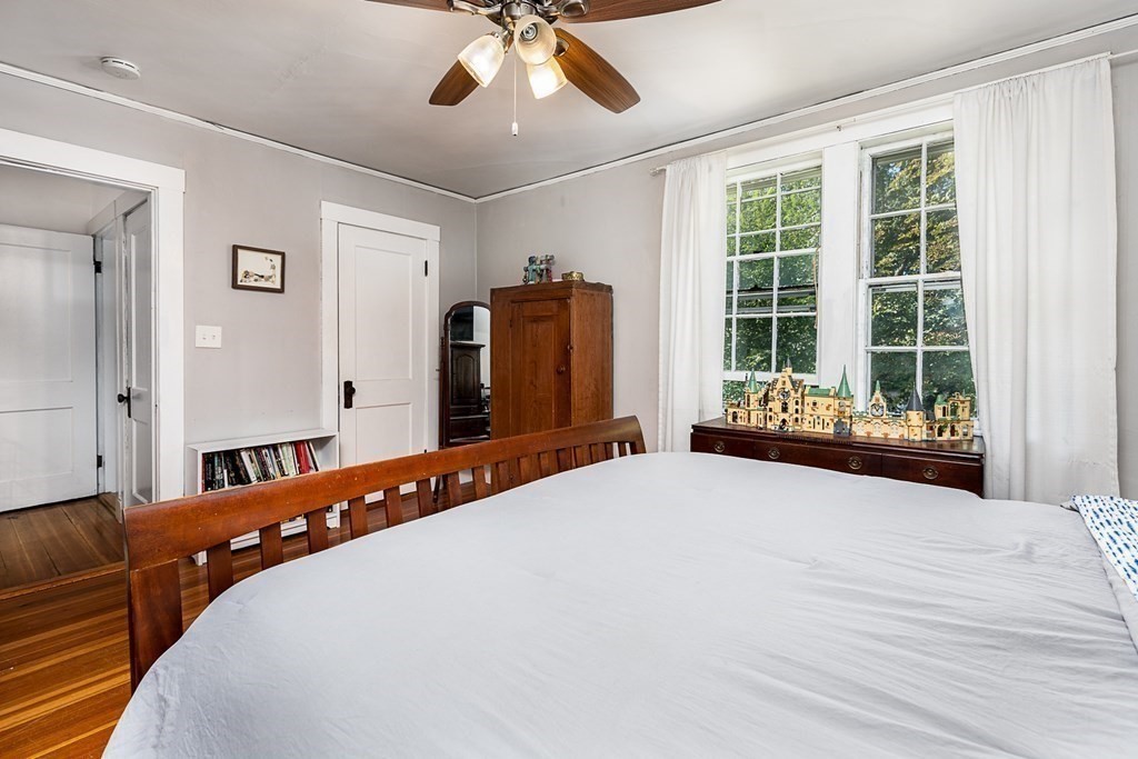 2 Orne Square, Unit 2 Salem, MA 01970 - Photo 15 of 28 a bedroom with a bed and a large window