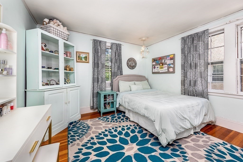 2 Orne Square, Unit 2 Salem, MA 01970 - Photo 17 of 28 a bedroom with a bed and a window