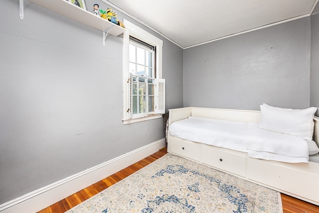 2 Orne Square, Unit 2 Salem, MA 01970 - Photo 19 of 28 a bedroom with a bed and a window