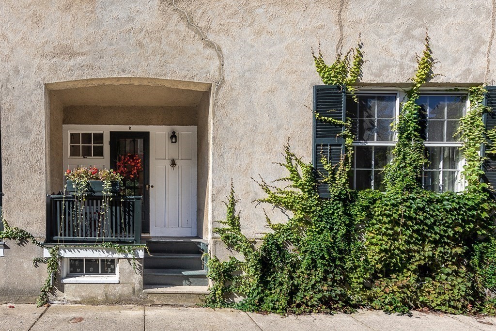 2 Orne Square, Unit 2 Salem, MA 01970 - Photo 2 of 28 front view of house with potted plants