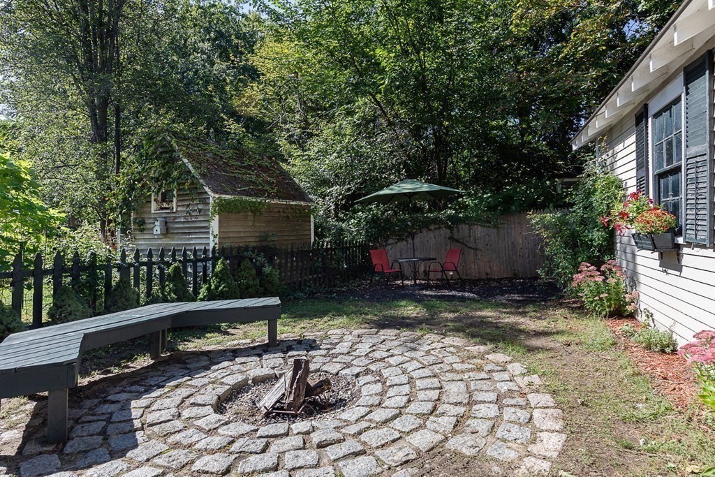 2 Orne Square, Unit 2 Salem, MA 01970 - Photo 27 of 28 a view of a chair and table in backyard