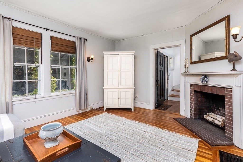 2 Orne Square, Unit 2 Salem, MA 01970 - Photo 6 of 28 a living room with furniture and a fireplace