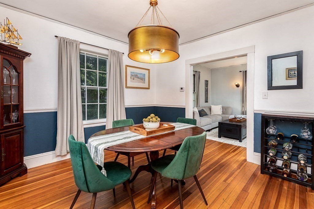 2 Orne Square, Unit 2 Salem, MA 01970 - Photo 8 of 28 a view of a dining room with furniture and wooden floor