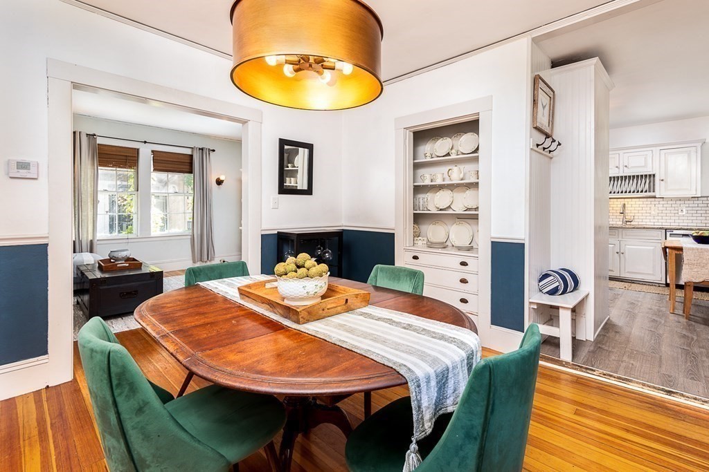 2 Orne Square, Unit 2 Salem, MA 01970 - Photo 9 of 28 a bedroom with a bed and wooden floor