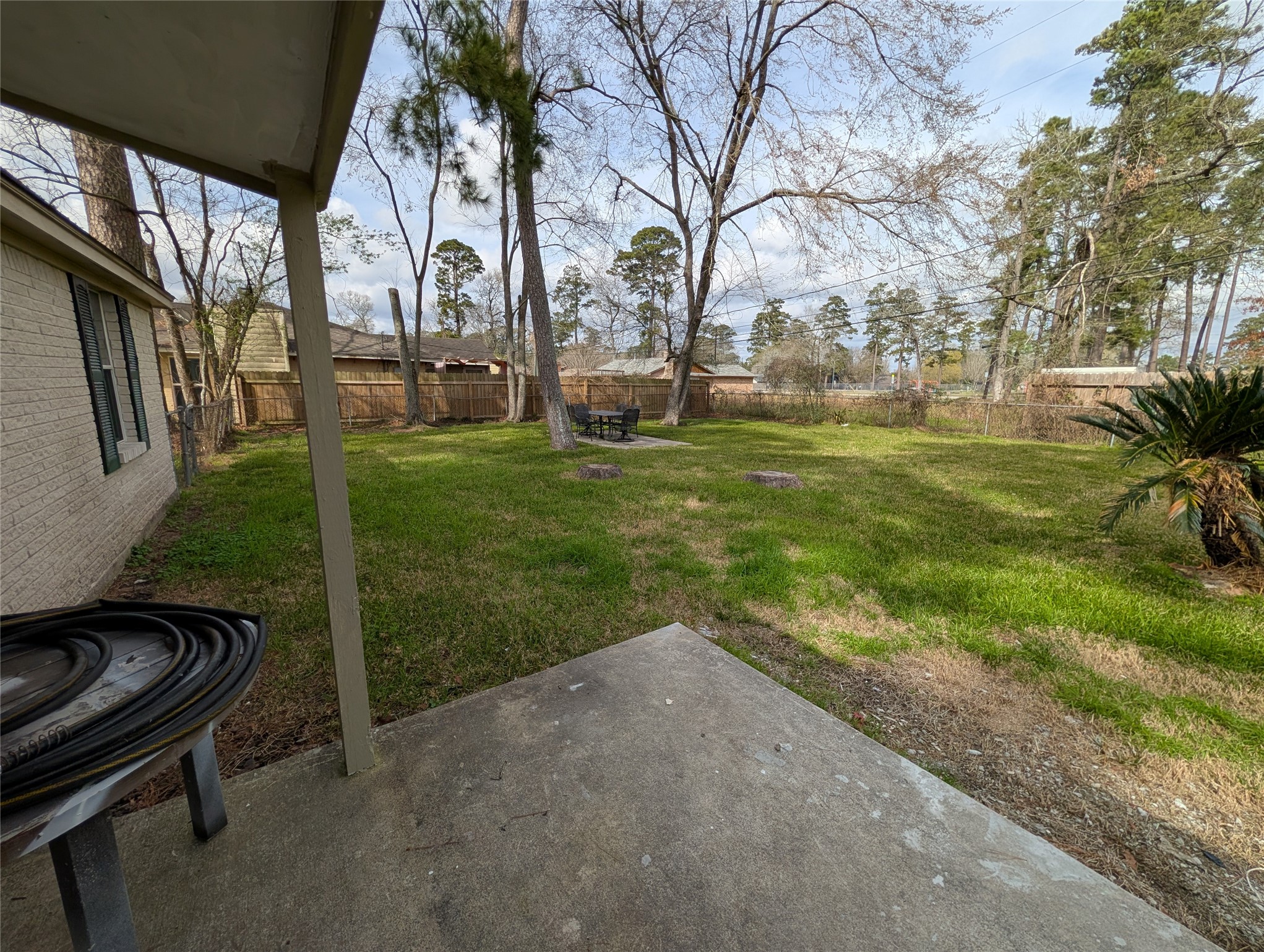 515 Broad Ripple Drive Houston, TX 77336 - Photo 16 of 21 a backyard of a house with lots of green space