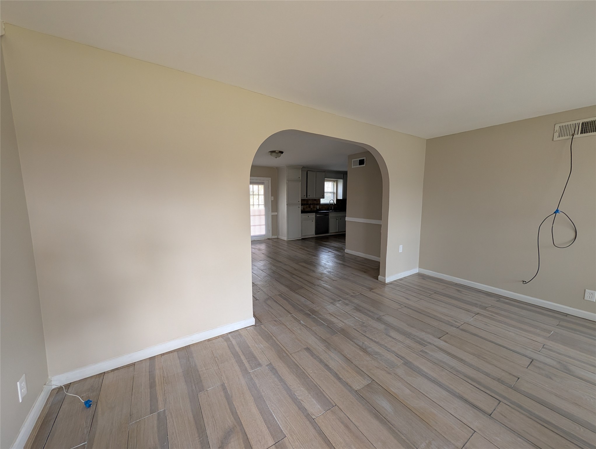 515 Broad Ripple Drive Houston, TX 77336 - Photo 2 of 21 a view of empty room with wooden floor