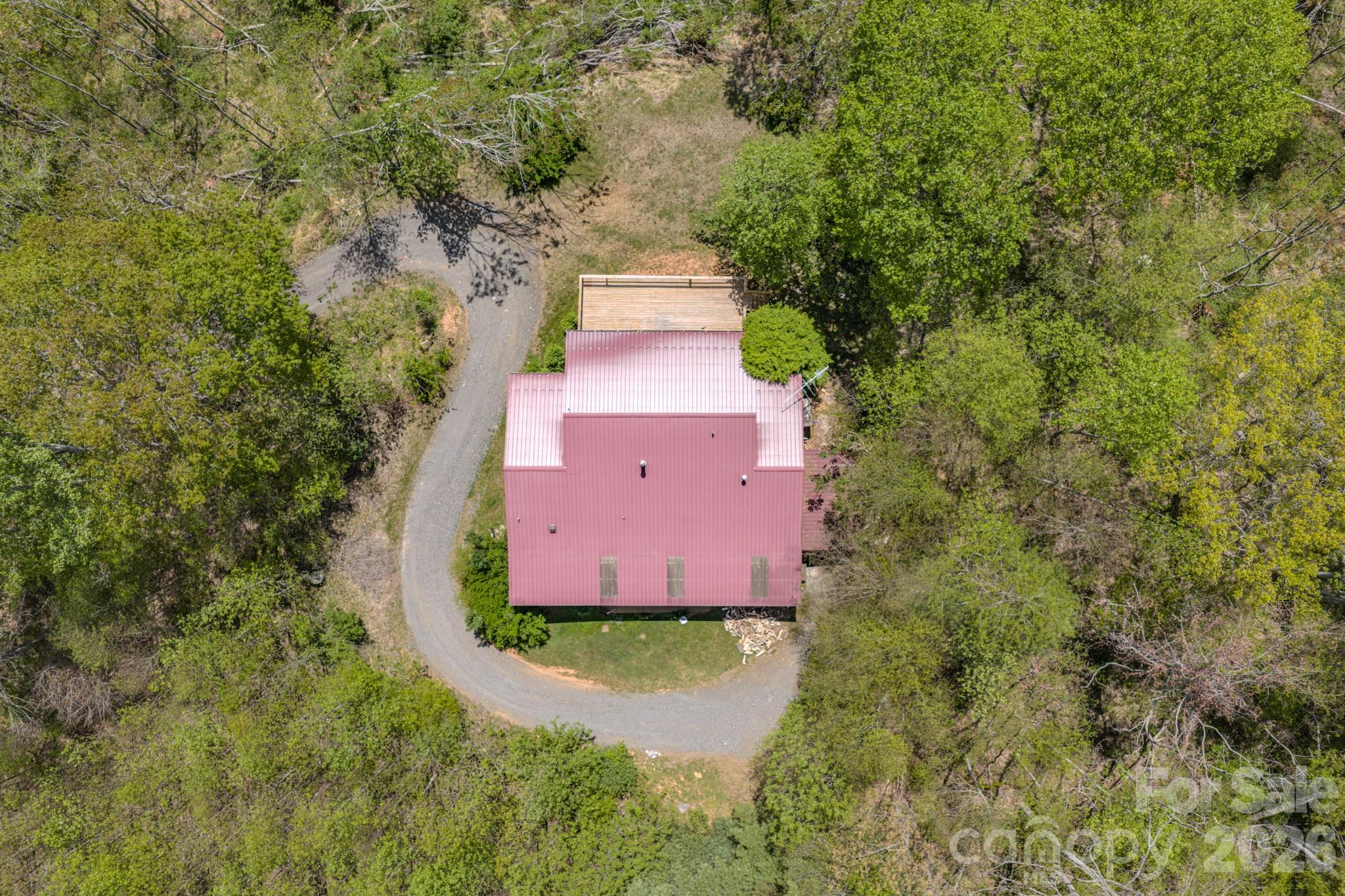 143 Gouge Cemetery Road Bakersville, NC 28705 - Photo 11 of 47 an aerial view of residential house with outdoor space and trees all around