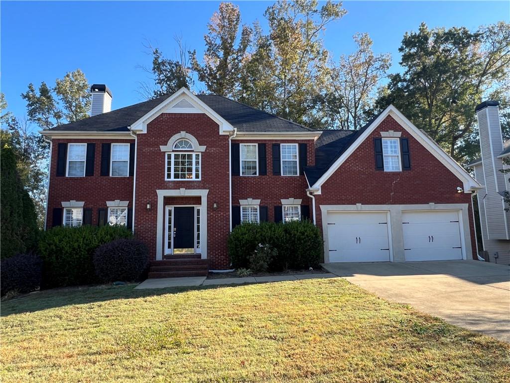 117 Trotter Way Dallas, GA 30132 - Photo 1 of 1 a front view of a house with a yard