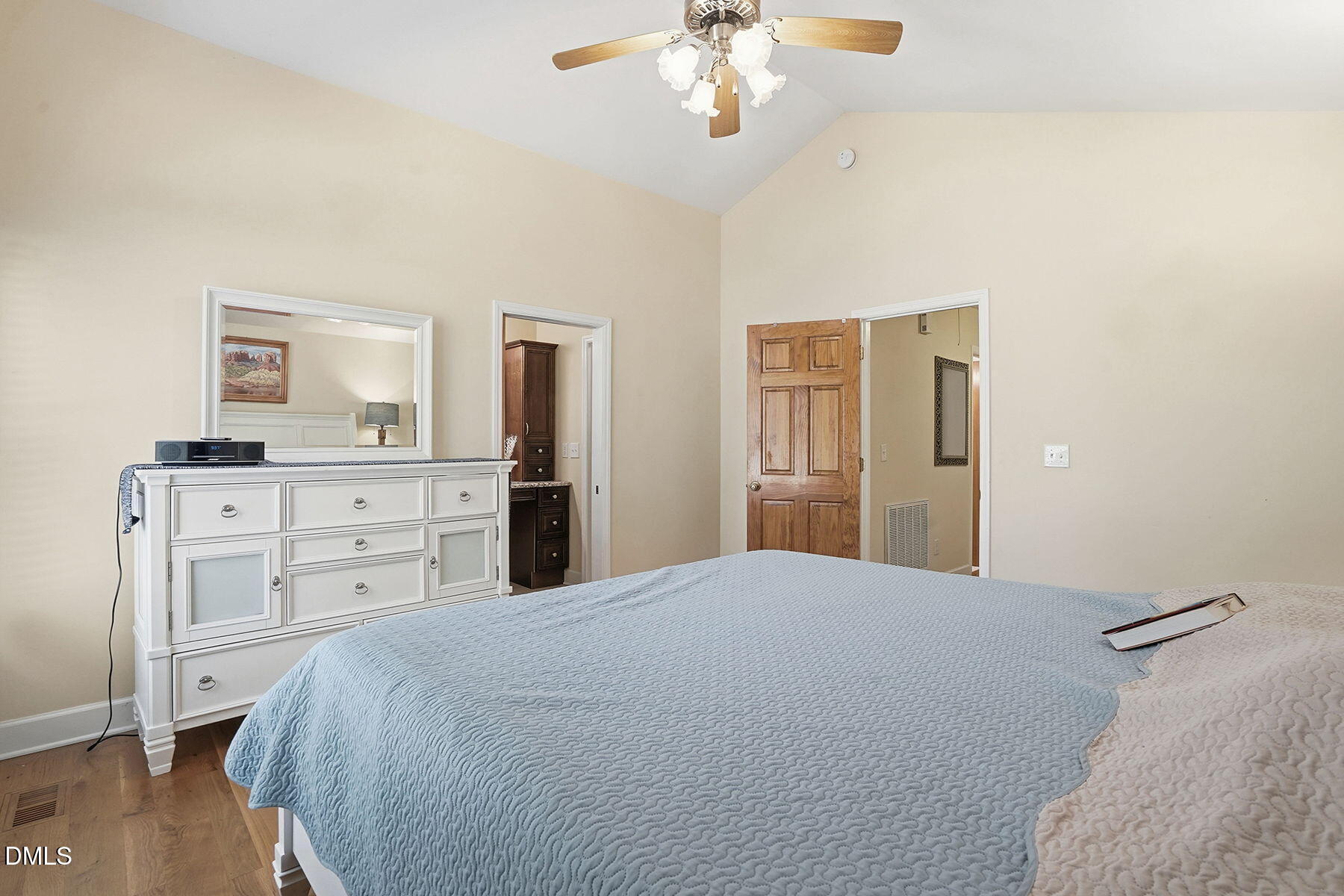 229 Plantation Road Clayton, NC 27520 - Photo 16 of 32 a spacious bedroom with a bed and a dresser