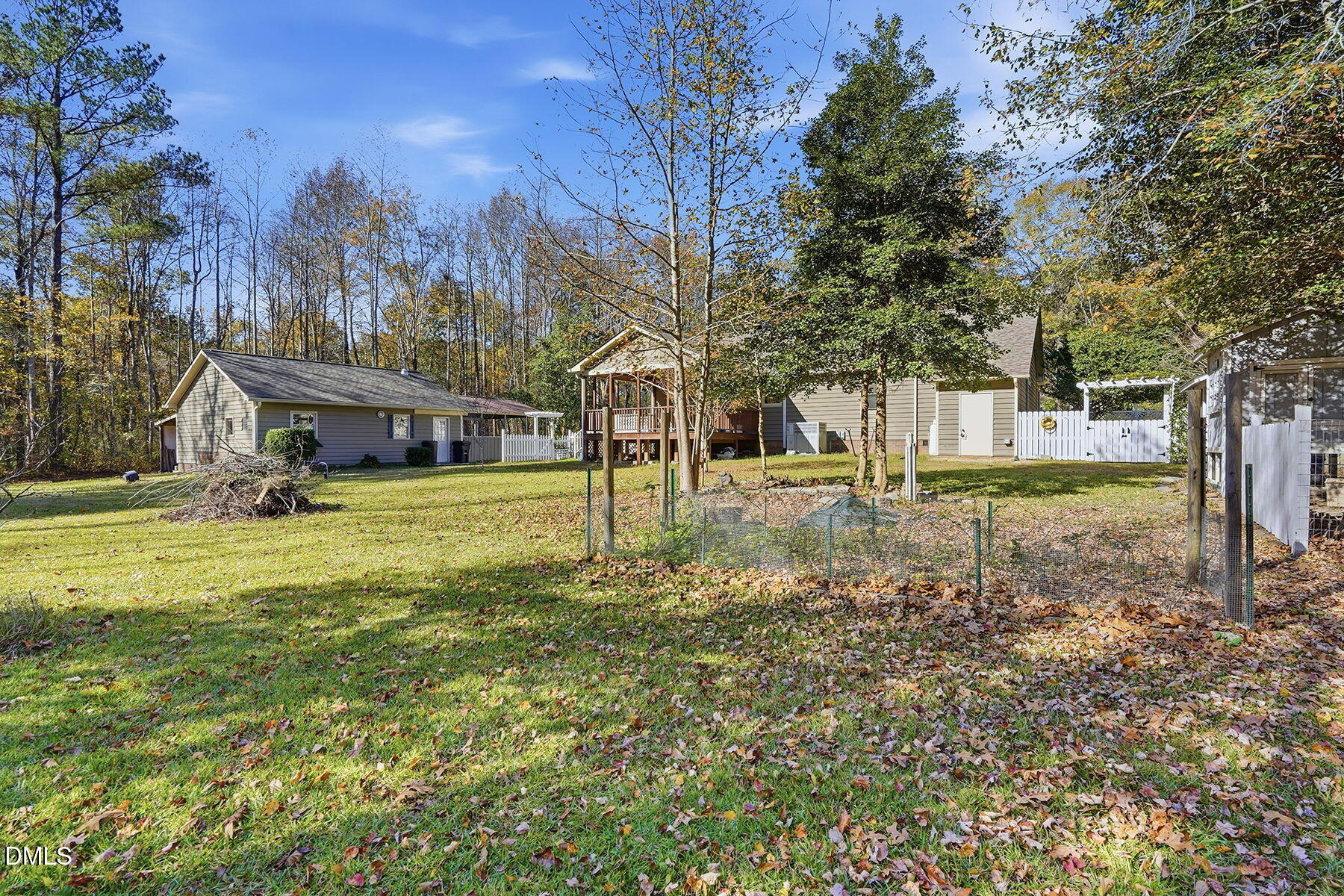 229 Plantation Road Clayton, NC 27520 - Photo 29 of 32 a view of a house with a yard