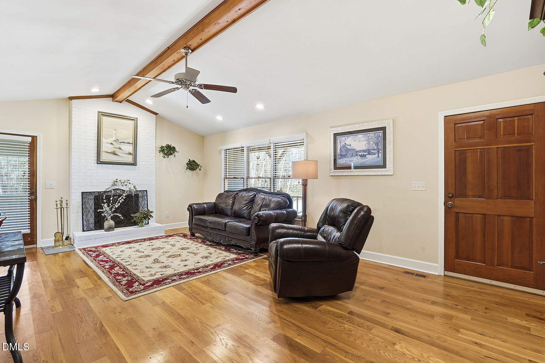 229 Plantation Road Clayton, NC 27520 - Photo 6 of 32 a living room with furniture rug and window