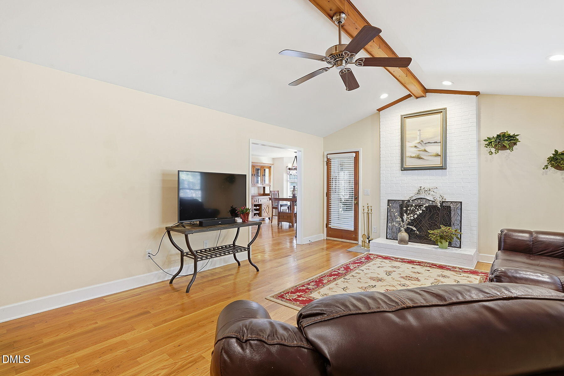 229 Plantation Road Clayton, NC 27520 - Photo 7 of 32 a bedroom with a bed and a chair