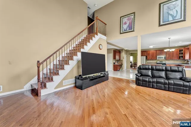 a view of living room with furniture and flat screen tv