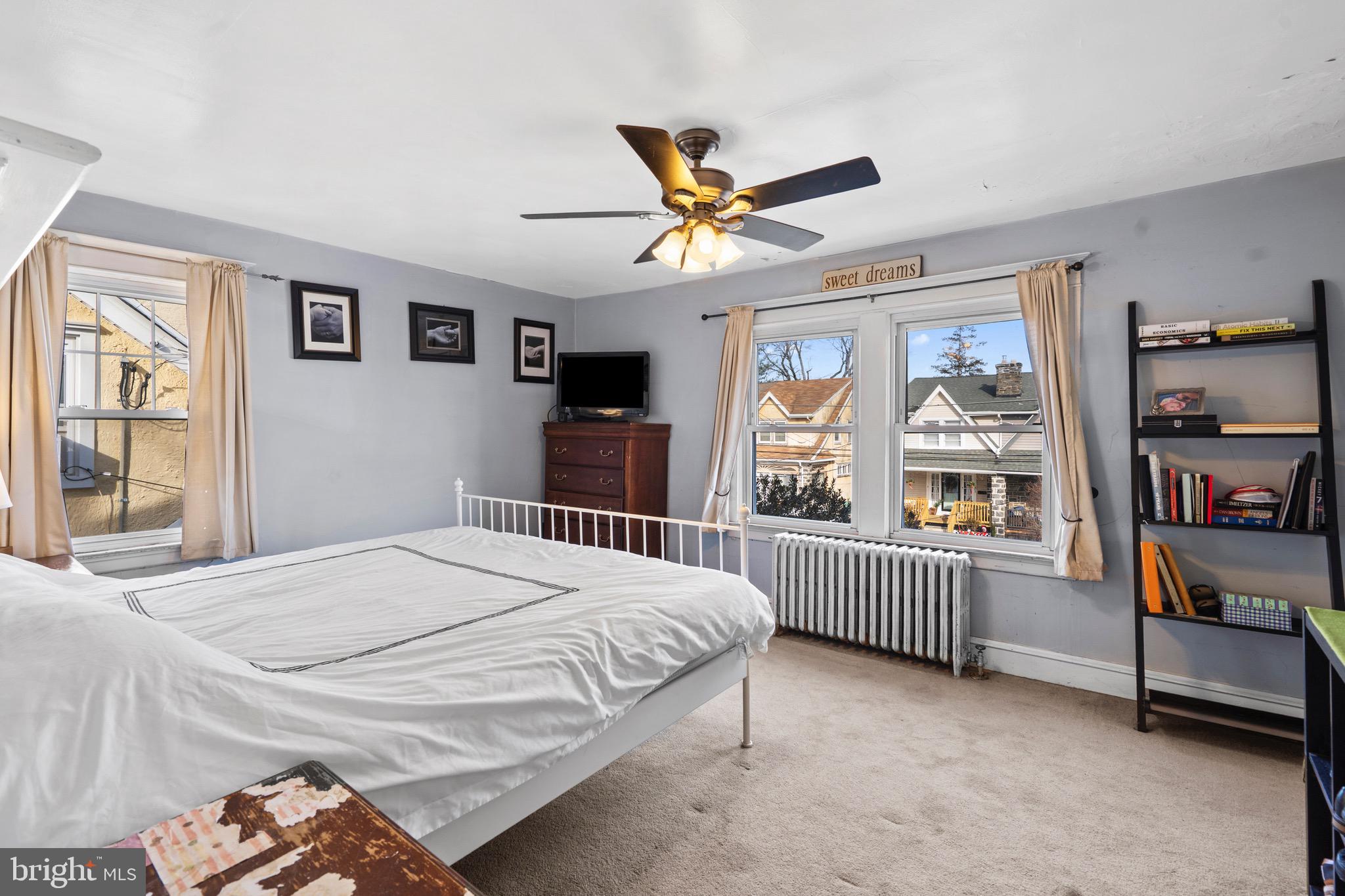122 Wilson Avenue Havertown, PA 19083 - Photo 17 of 30 a bedroom with bed and windows