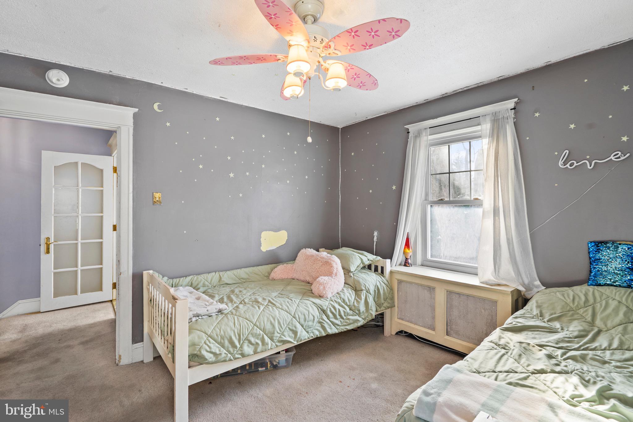 122 Wilson Avenue Havertown, PA 19083 - Photo 21 of 30 a bedroom with a bed and a window