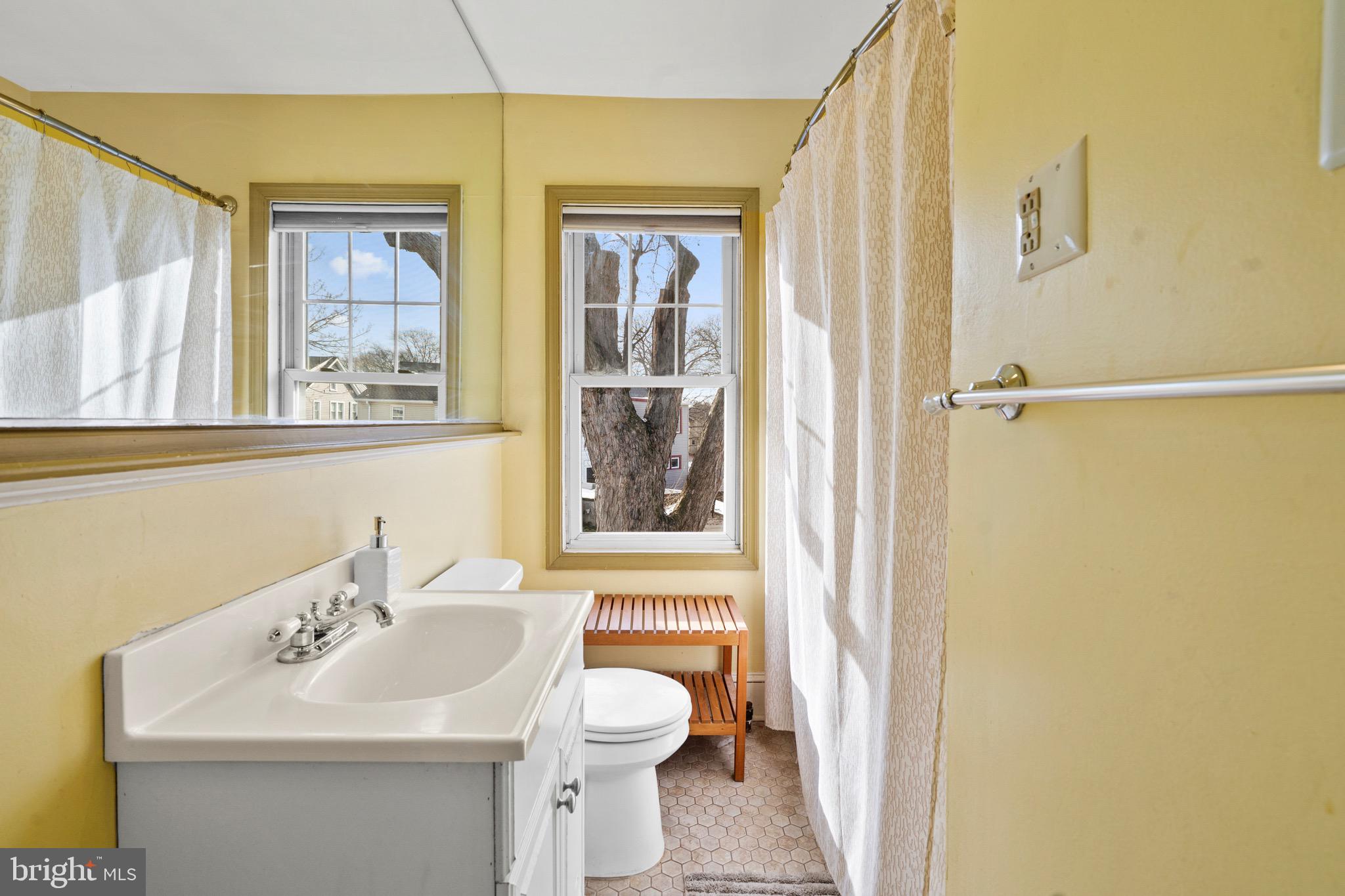 122 Wilson Avenue Havertown, PA 19083 - Photo 23 of 30 a bathroom with a sink a toilet and shower