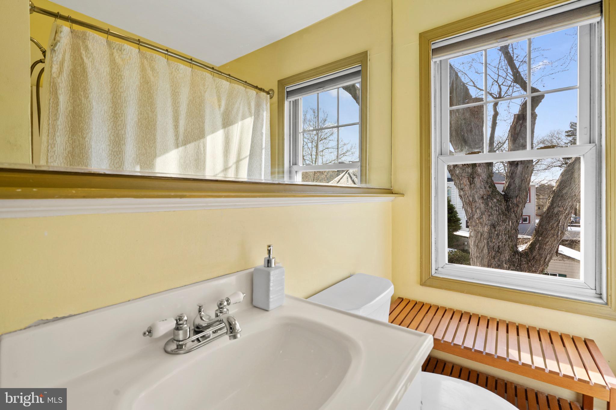 122 Wilson Avenue Havertown, PA 19083 - Photo 24 of 30 a bathroom with a bathtub and a window