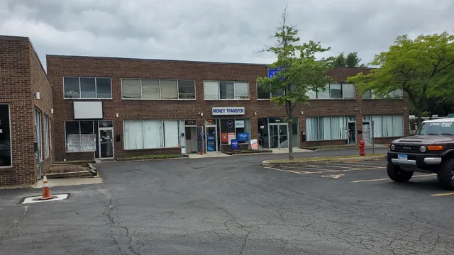 a view of street with parked cars