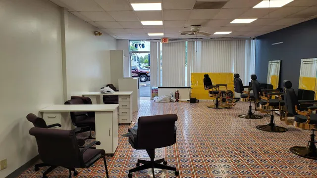 a living room with furniture a large window and a table