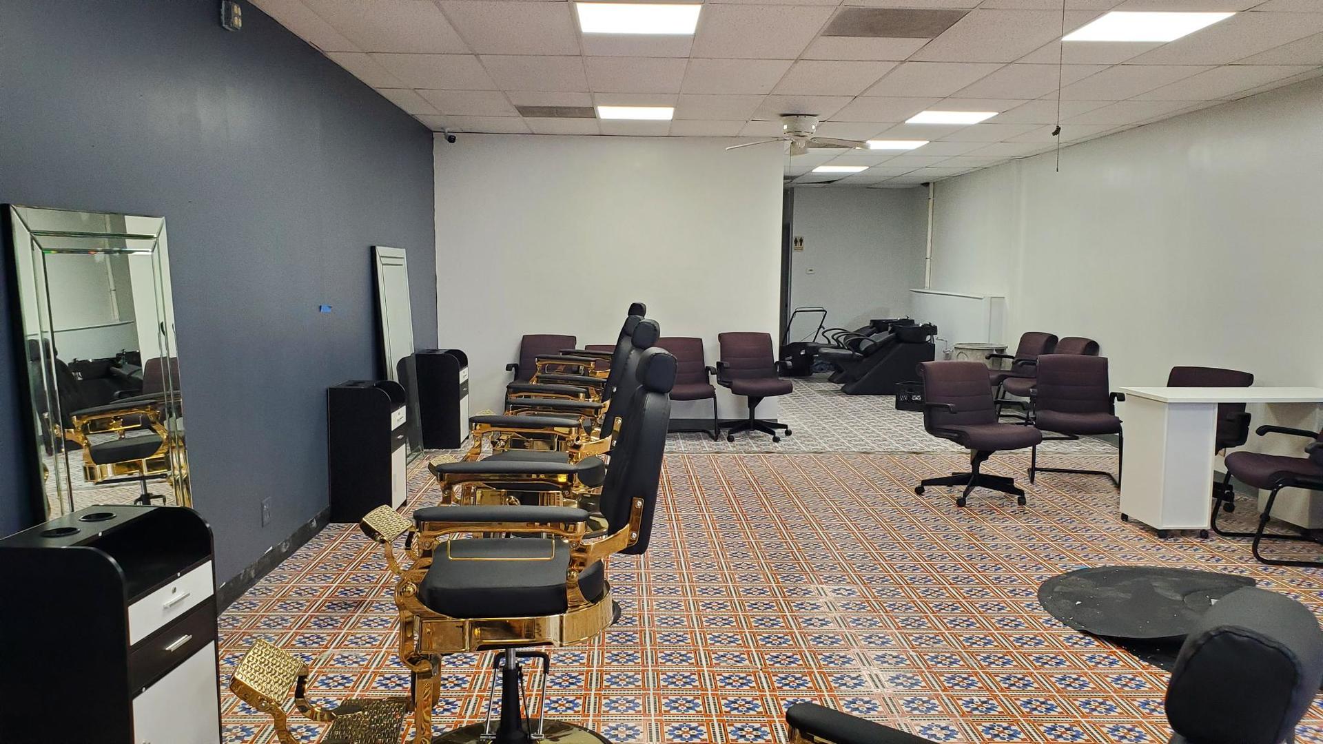 983 West Wise Road, Unit 983 Schaumburg, IL 60193 - Photo 10 of 13 a living room with furniture and a flat screen tv