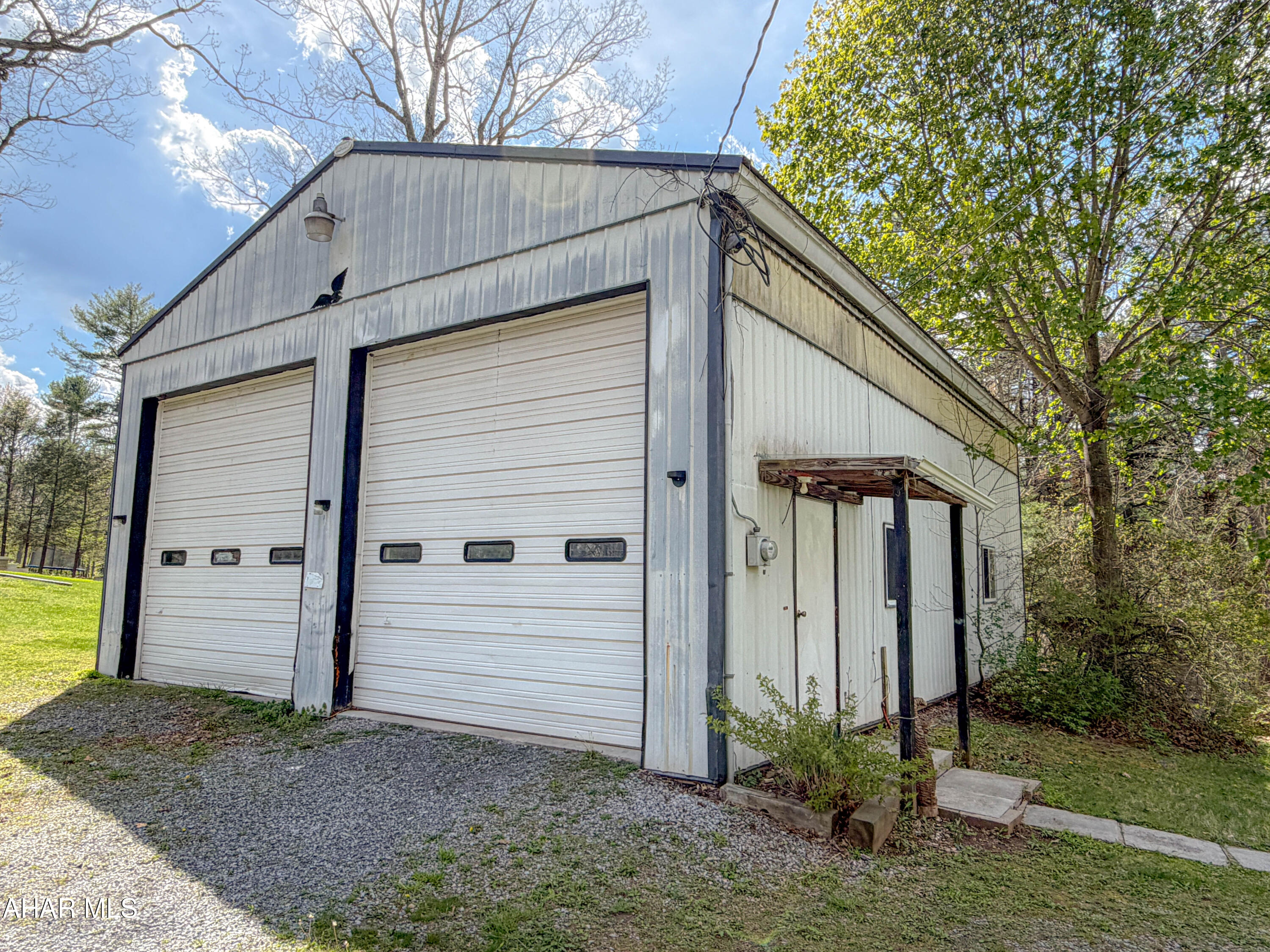 151 Pine Echo Road Everett, PA 15537 - Photo 40 of 51 a view of a house with a yard