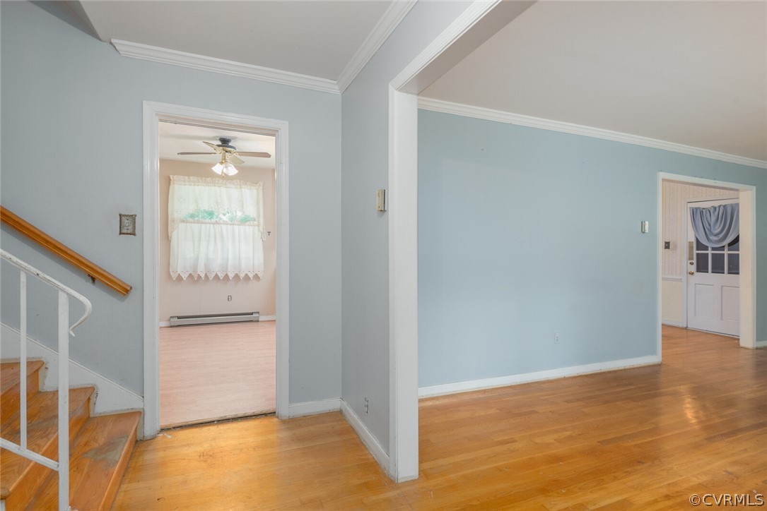 3617 Frontier Drive Richmond, VA 23225 - Photo 12 of 38 an empty room with wooden floor and windows