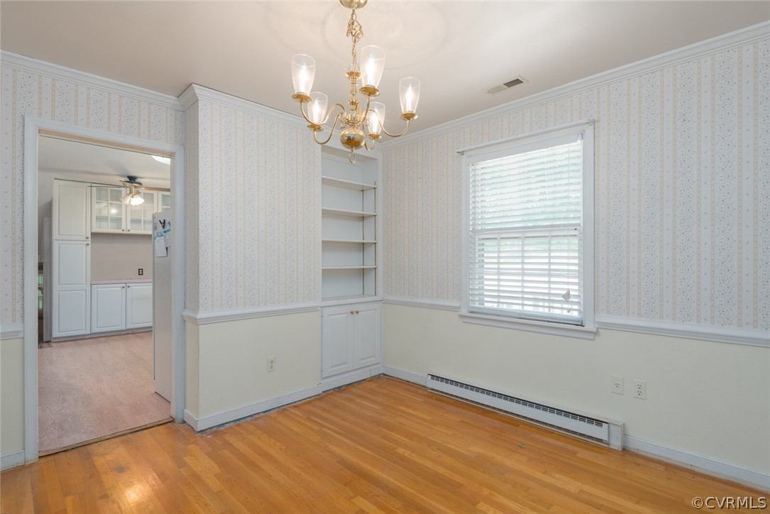 3617 Frontier Drive Richmond, VA 23225 - Photo 15 of 38 wooden floor in an empty room with a window