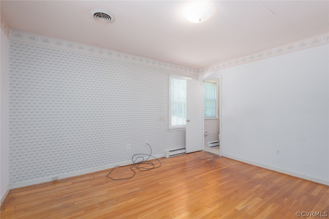 3617 Frontier Drive Richmond, VA 23225 - Photo 26 of 38 a view of empty room with wooden floor