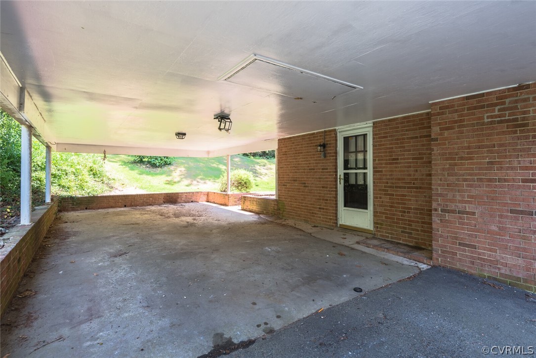 3617 Frontier Drive Richmond, VA 23225 - Photo 3 of 38 a view of a porch with wooden floor and a window