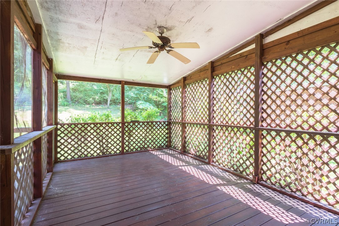3617 Frontier Drive Richmond, VA 23225 - Photo 9 of 38 en empty room with wooden floor and large window