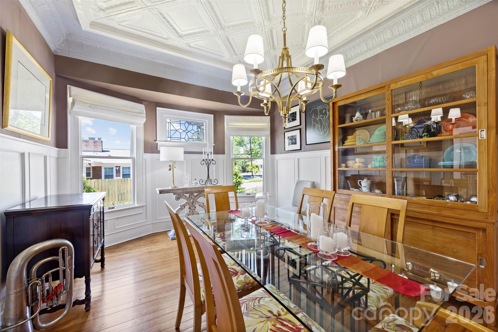 207 West Academy Street Cherryville, NC 28021 - Photo 15 of 45 a view of a dining room with furniture and a chandelier