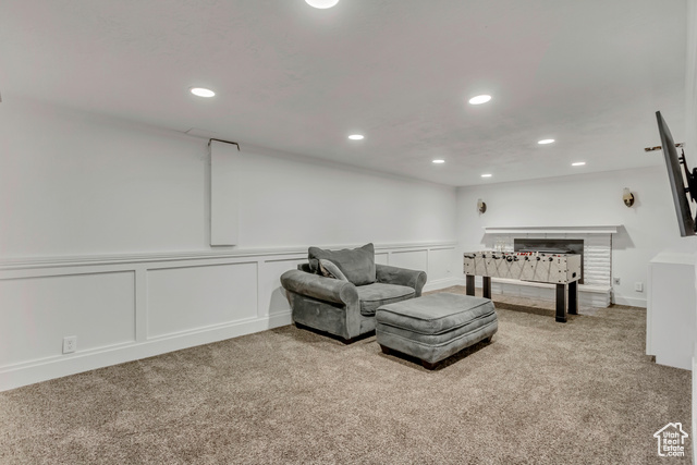 360 East Center Street Centerville, UT 84014 - Photo 35 of 41 Living area with a decorative wall, light colored carpet, recessed lighting, and a wainscoted wall
