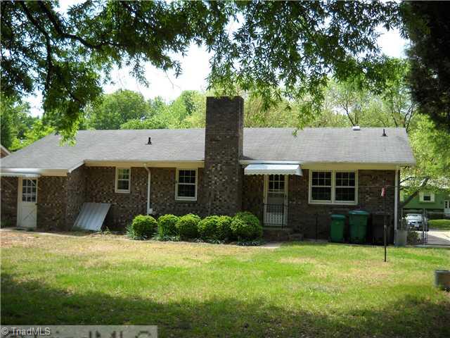 3218 Pine Needles Road High Point, NC 27265 - Photo 2 of 12 Exterior Back. The door at the left of the picture is additional storage.