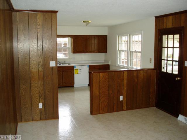 3218 Pine Needles Road High Point, NC 27265 - Photo 4 of 12 Den/Family/Great Room. Den opens to the eat-in kitchen