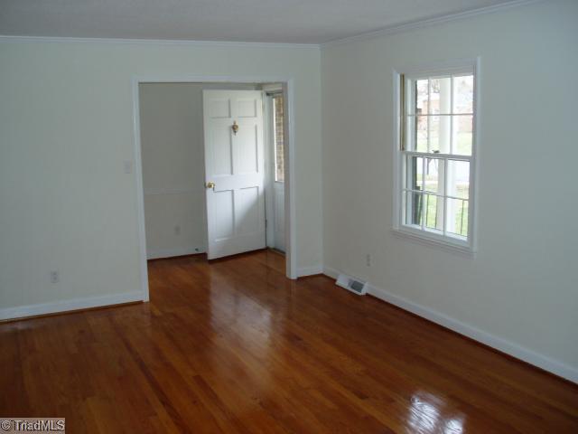 3218 Pine Needles Road High Point, NC 27265 - Photo 7 of 12 Living Room. Liviing room and front entry