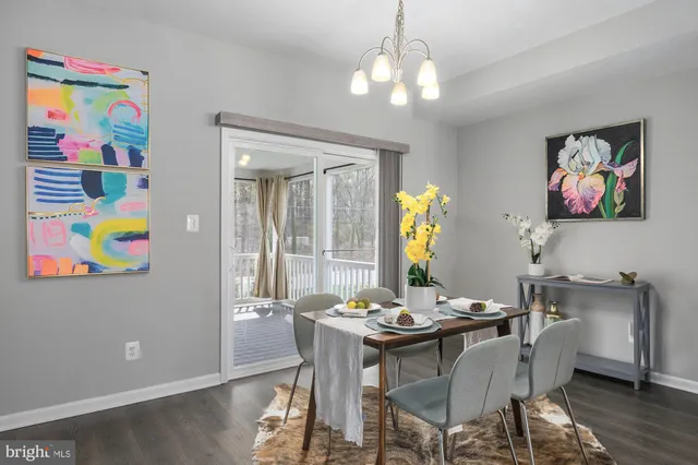 a view of a balcony with wooden floor