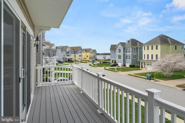a kitchen with stainless steel appliances granite countertop a sink a stove top oven a counter space and cabinets