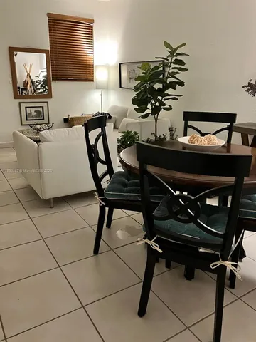 a view of a workspace with furniture