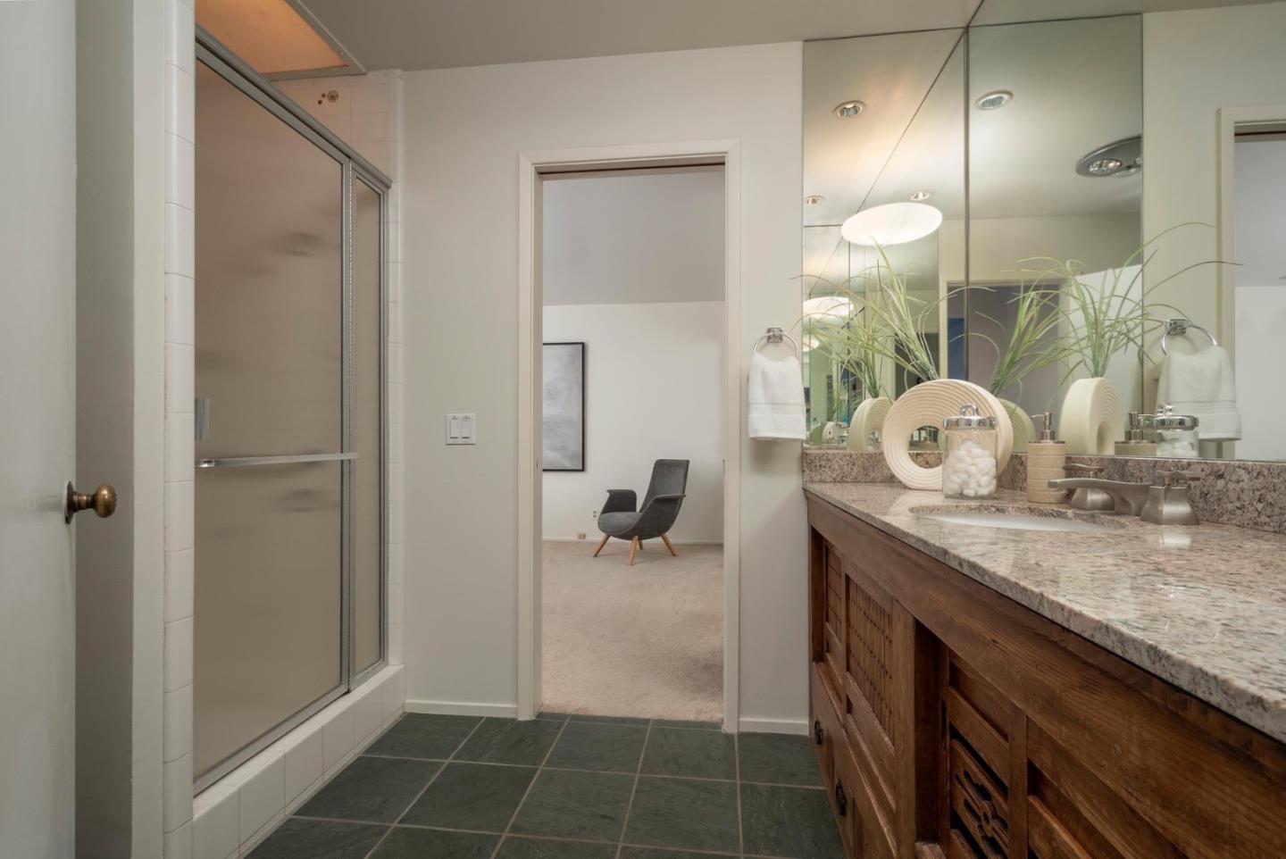 210 Hardwick Road Woodside, CA 94062 - Photo 14 of 29 a bathroom with a granite countertop sink a toilet and a mirror