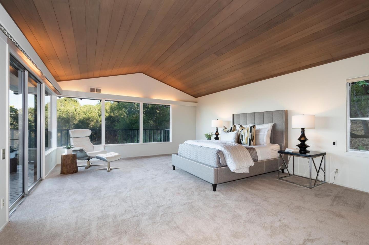 210 Hardwick Road Woodside, CA 94062 - Photo 18 of 29 a bed room with furniture and a large window