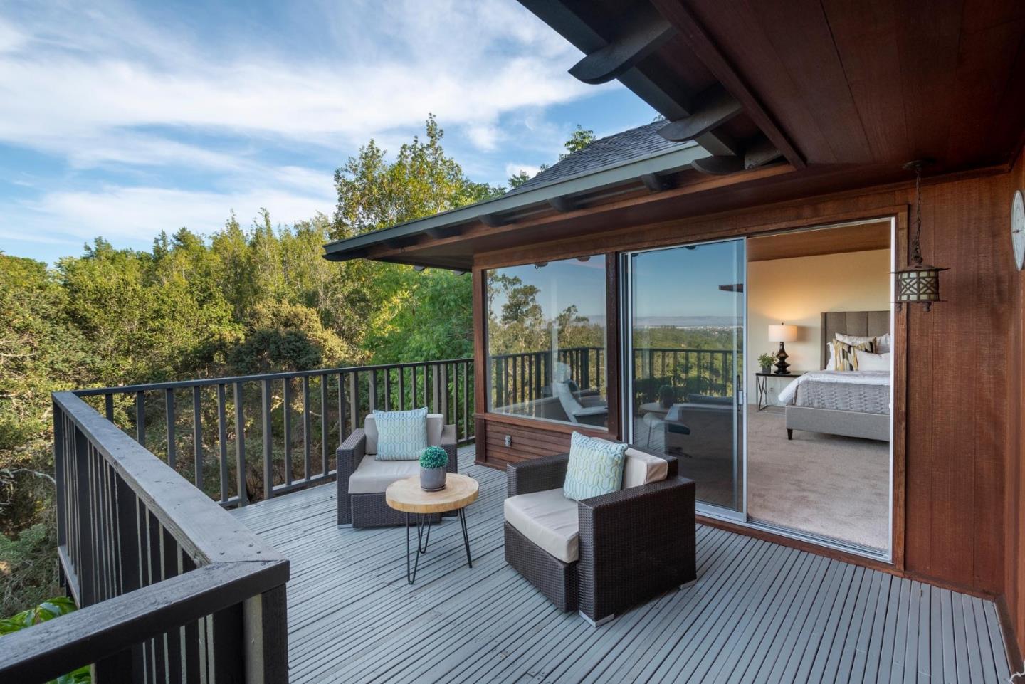 210 Hardwick Road Woodside, CA 94062 - Photo 23 of 29 a balcony with furniture and wooden floor