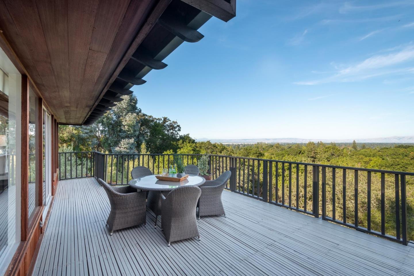 210 Hardwick Road Woodside, CA 94062 - Photo 25 of 29 a view of a balcony with mountain view and wooden floor