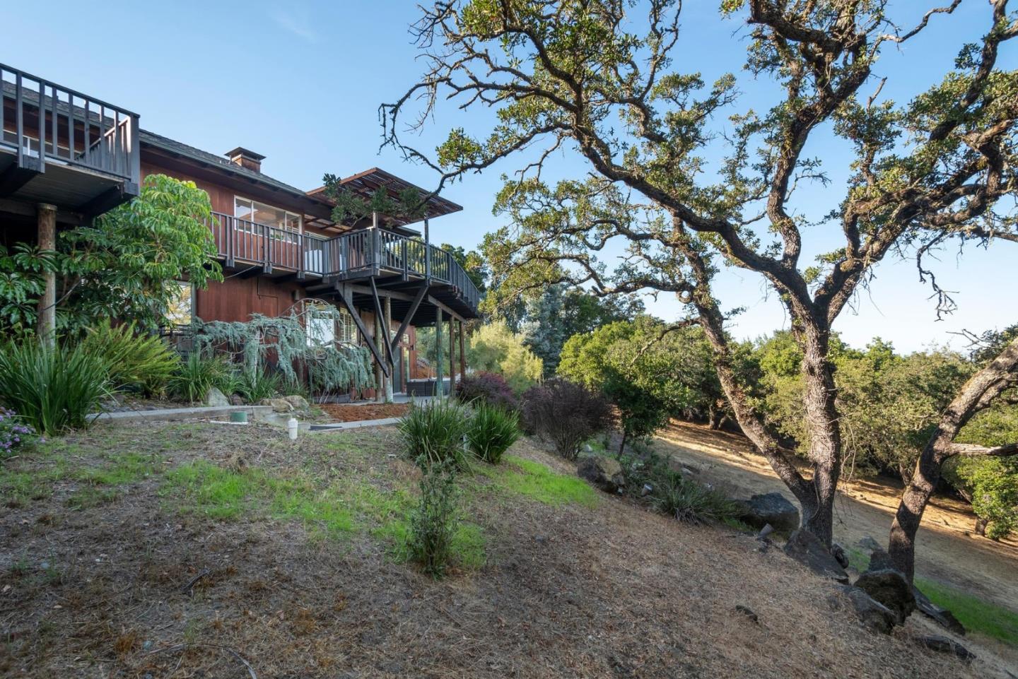 210 Hardwick Road Woodside, CA 94062 - Photo 28 of 29 a view of a house with a yard