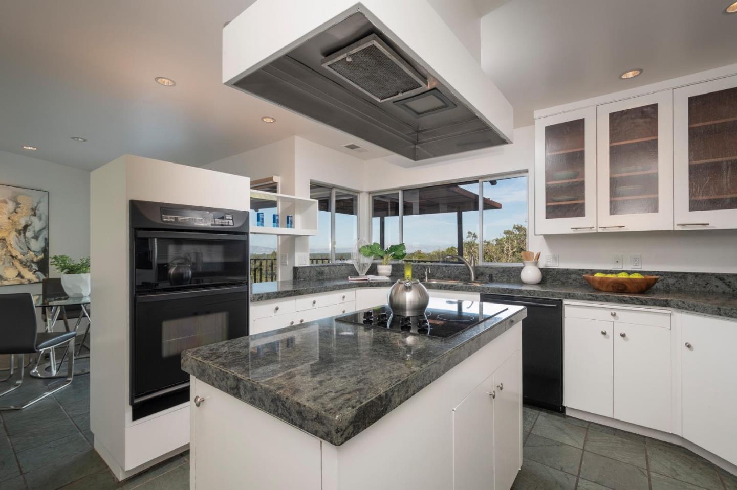 210 Hardwick Road Woodside, CA 94062 - Photo 9 of 29 a kitchen with granite countertop a sink a counter space appliances and cabinets